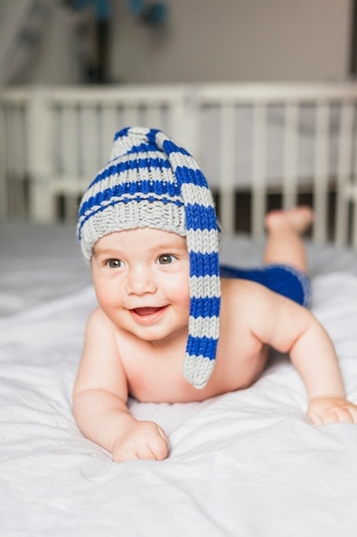 baby-wearing-striped-knitted-hat_23-2147983459.jpg