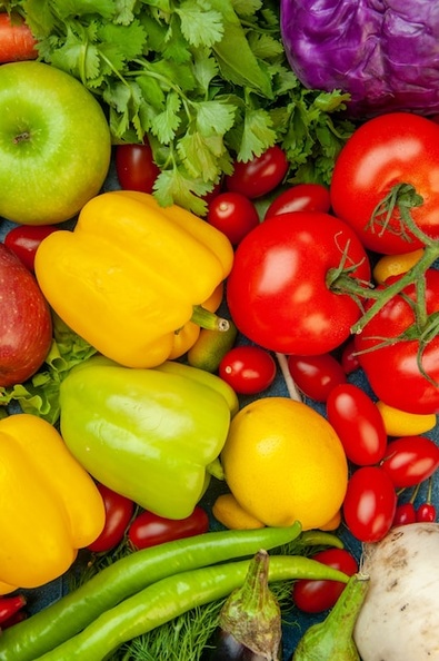top-view-fruits-vegetables-cherry-tomatoes-lemon-tomatoes-apple-red-cabbage-coriander_140725-145428.jpg