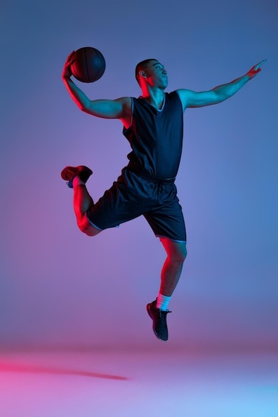 portrait-active-boy-basketball-player-jump-training-isolated-gradient-purple-pink-background_155003-45773.jpg
