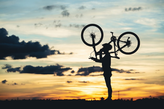 cyclist-resting-silhouette-sunset-active-outdoor-sport-concept_1150-16696.jpg