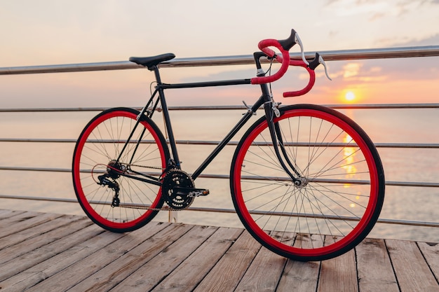 hipster-bicycle-morning-sunrise-by-sea_285396-5393.jpg