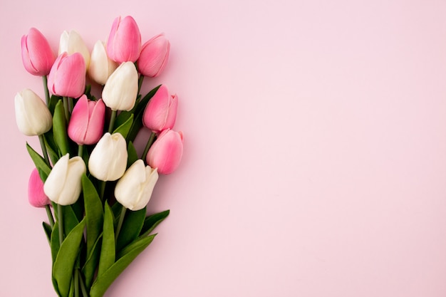 tulips-bouquet-pink-background-with-copyspace_24972-271.jpg