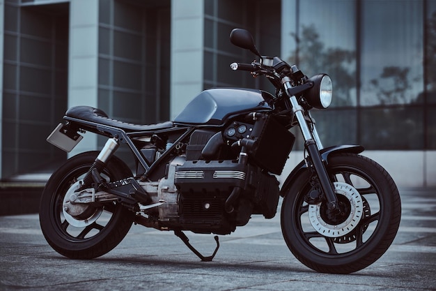 photo-custom-made-retro-motorcycle-against-skyscraper_613910-18743.jpg